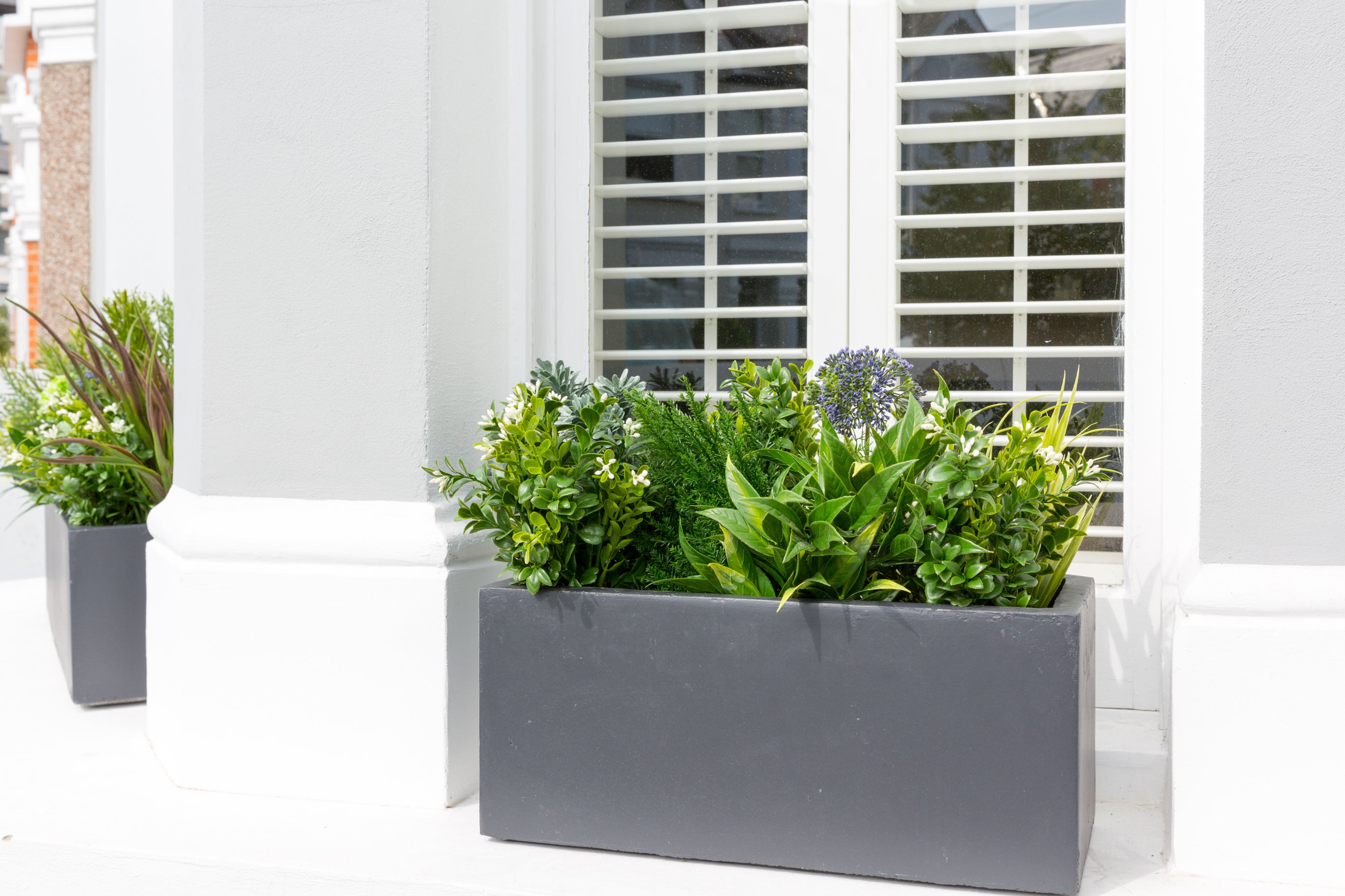 Small Hampstead Lead window box with artificial flowers